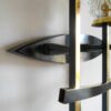 A Mid Century Modern wall sconce by Fiona Bradshaw Designs
