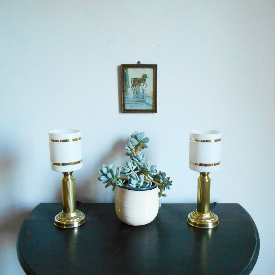 A pair of antique brass carriage table lamps by Fiona Bradshaw Designs