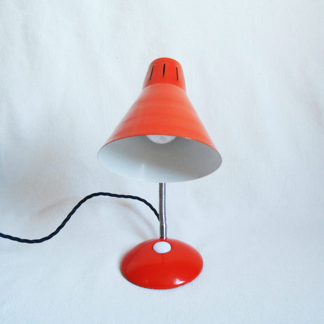 A retro orange spot lamp by Fiona Bradshaw Designs