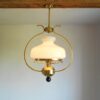 A vintage brass oil lamp by Fiona Bradshaw Designs