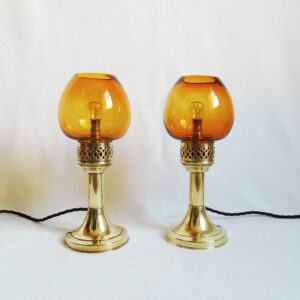 A pair of antique brass table lamps by Fiona Bradshaw Designs