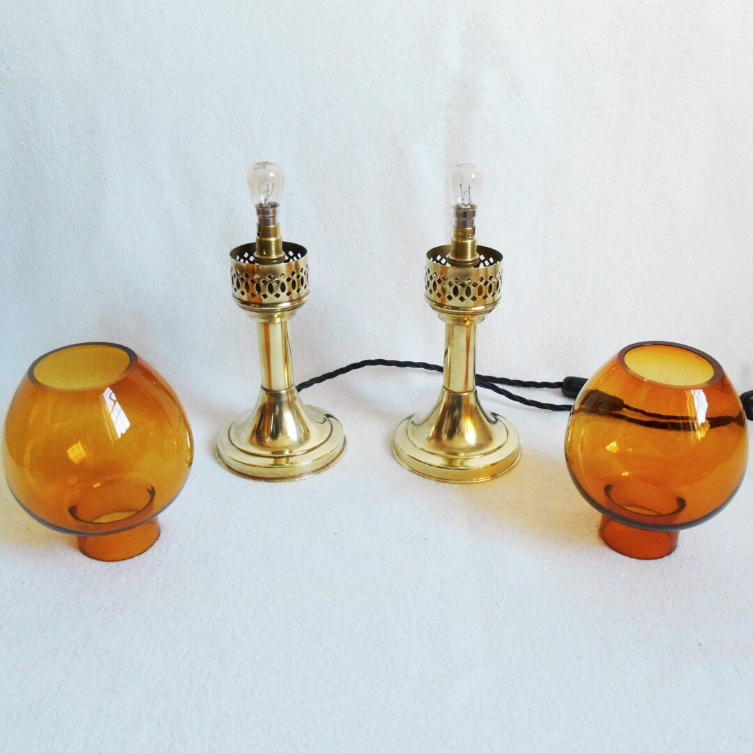 A pair of antique brass table lamps by Fiona Bradshaw Designs