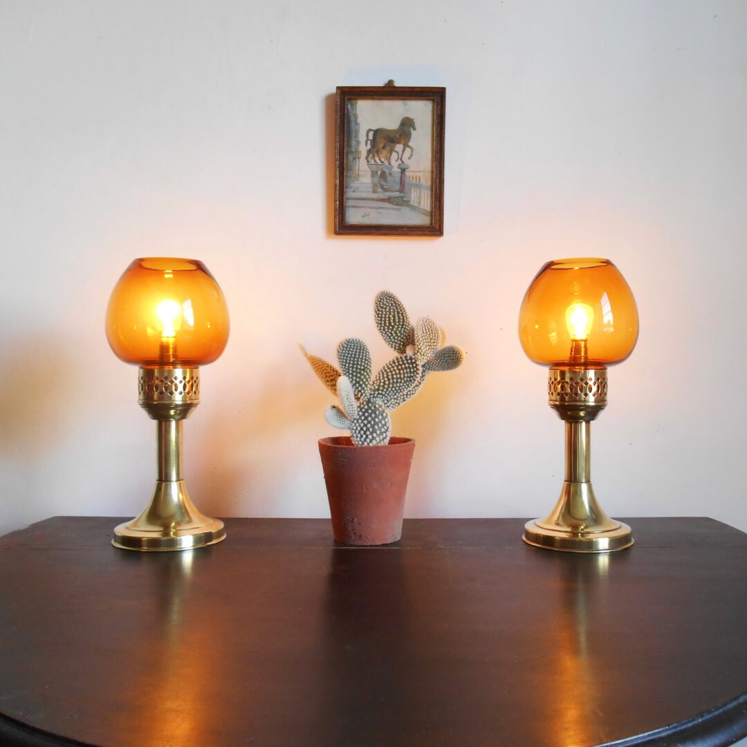 A pair of antique brass table lamps by Fiona Bradshaw Designs