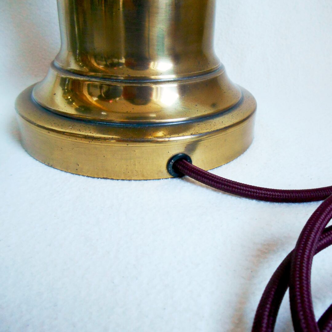 A pair of large brass table lamps by Fiona Bradshaw Designs