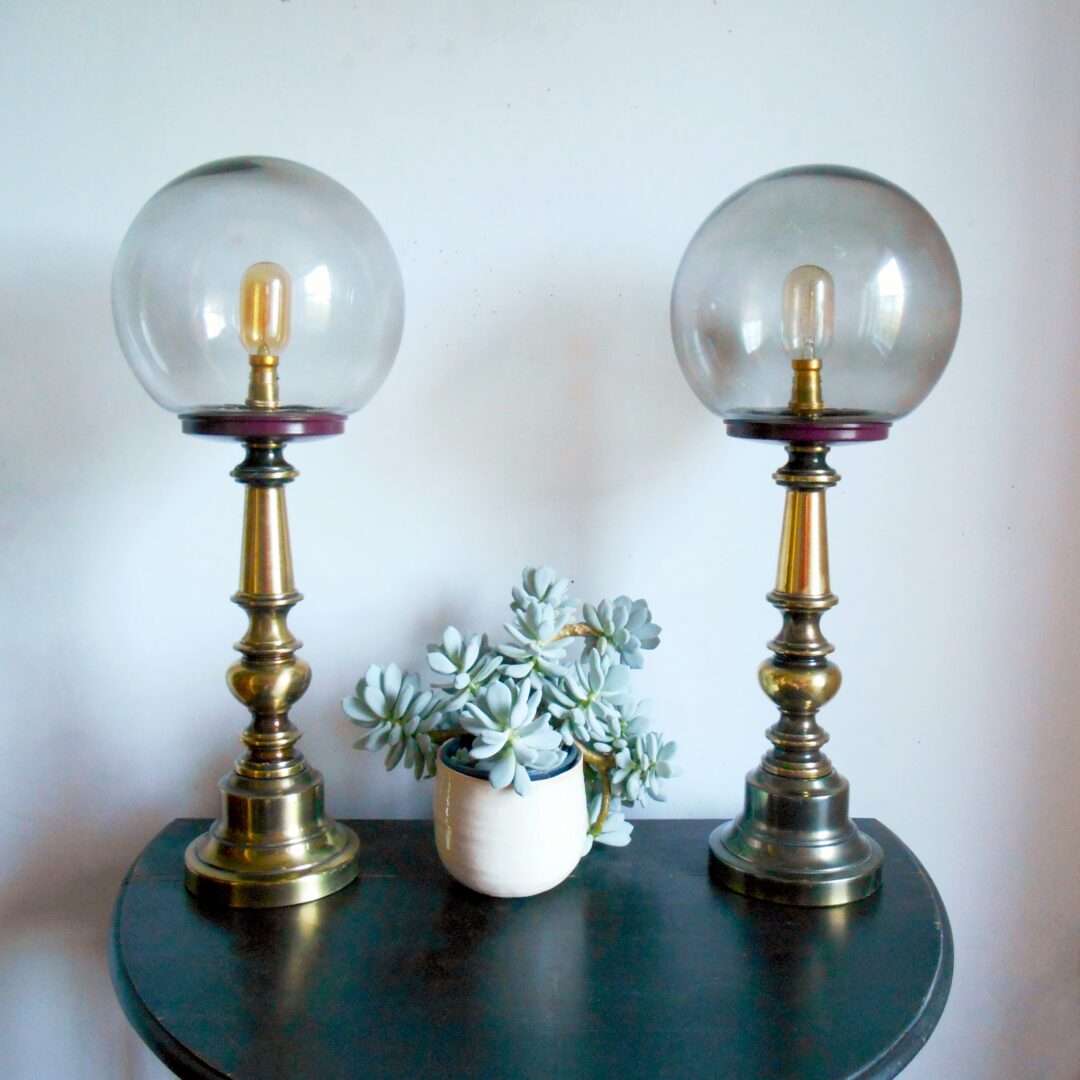 A pair of large brass table lamps by Fiona Bradshaw Designs