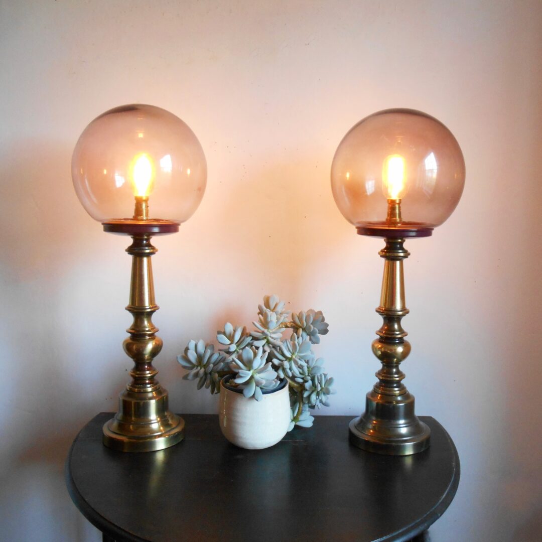 A pair of large brass table lamps by Fiona Bradshaw Designs