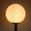 A mid century modern teak floor lamp by Fiona Bradshaw Designs