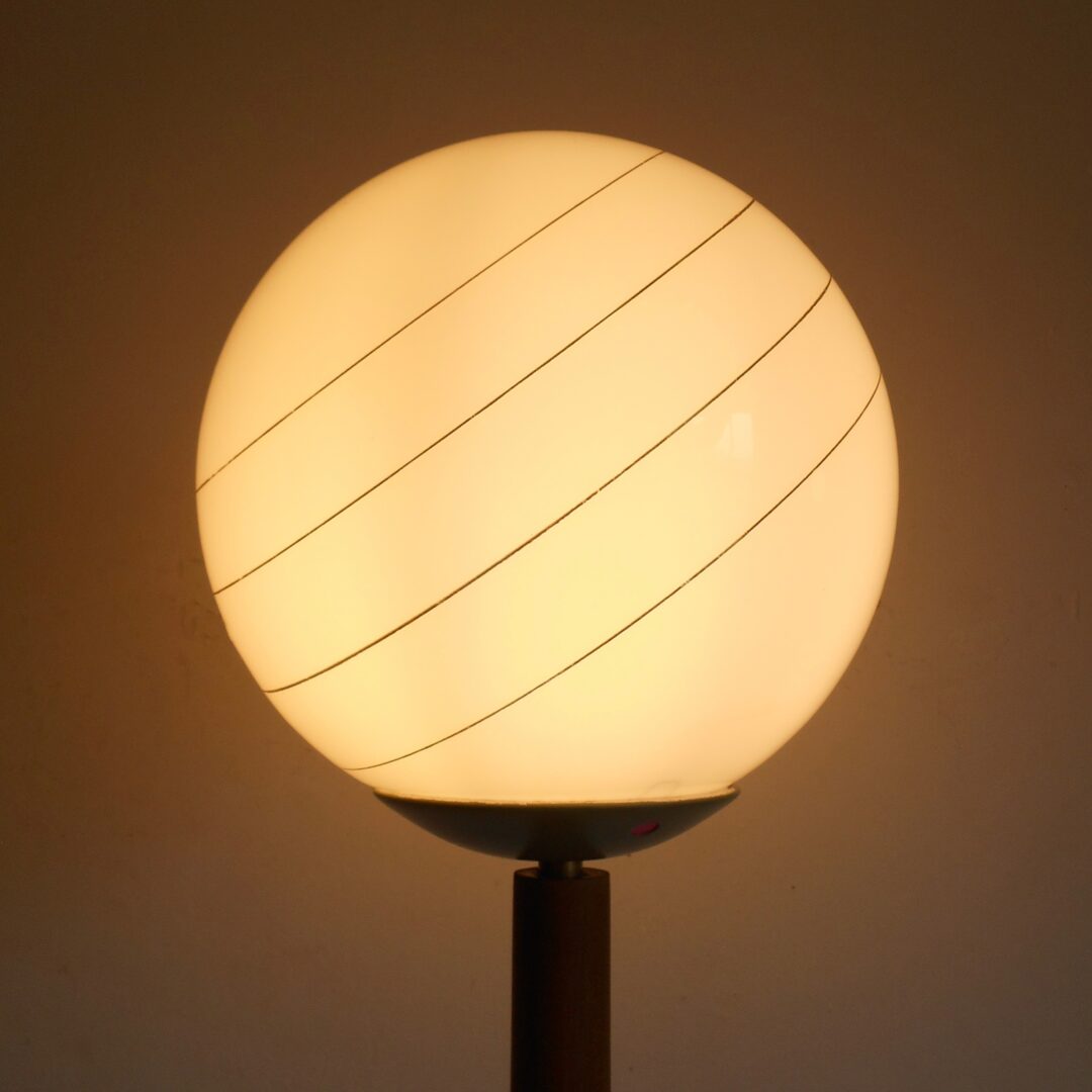 A mid century modern teak floor lamp by Fiona Bradshaw Designs