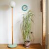 A mid century modern teak floor lamp by Fiona Bradshaw Designs