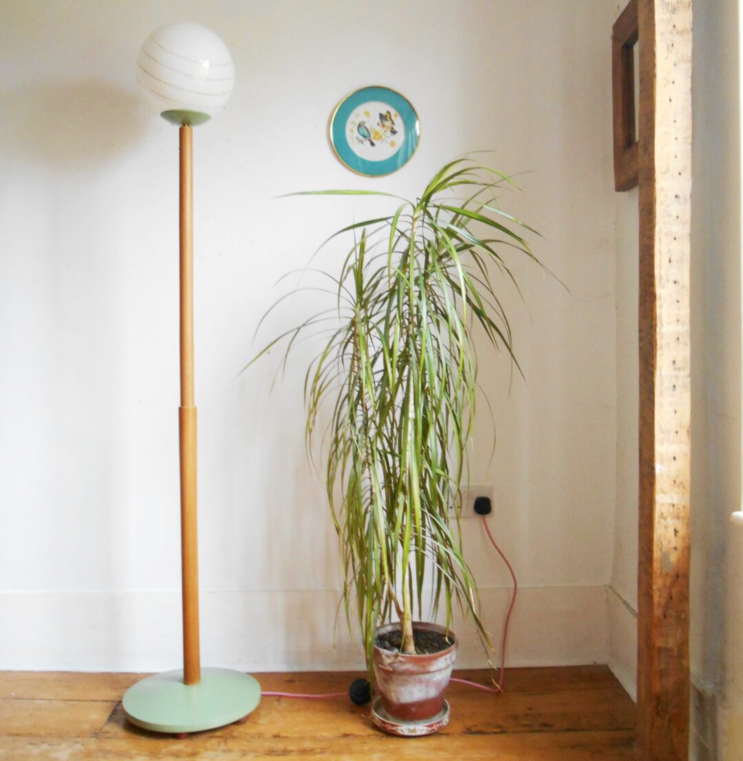 A mid century modern teak floor lamp by Fiona Bradshaw Designs