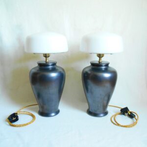 A pair of metallic grey table lamps by Fiona Bradshaw Designs