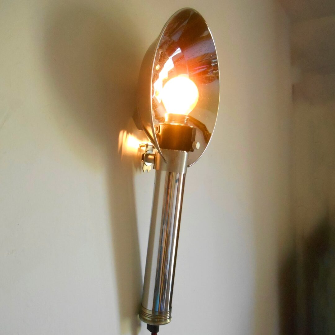 A retro camera flash converted into a wall lamp by Fiona Bradshaw Designs