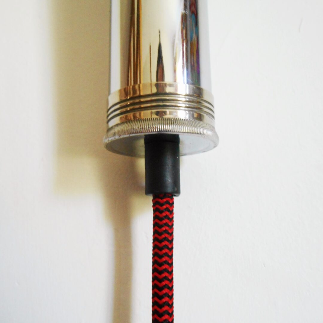 A retro camera flash converted into a wall lamp by Fiona Bradshaw Designs