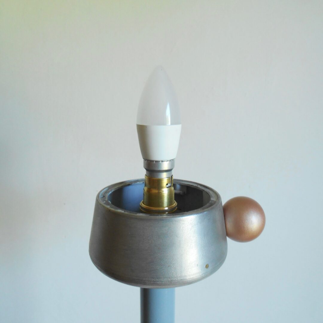 A mid century style floor lamp by Fiona Bradshaw Designs