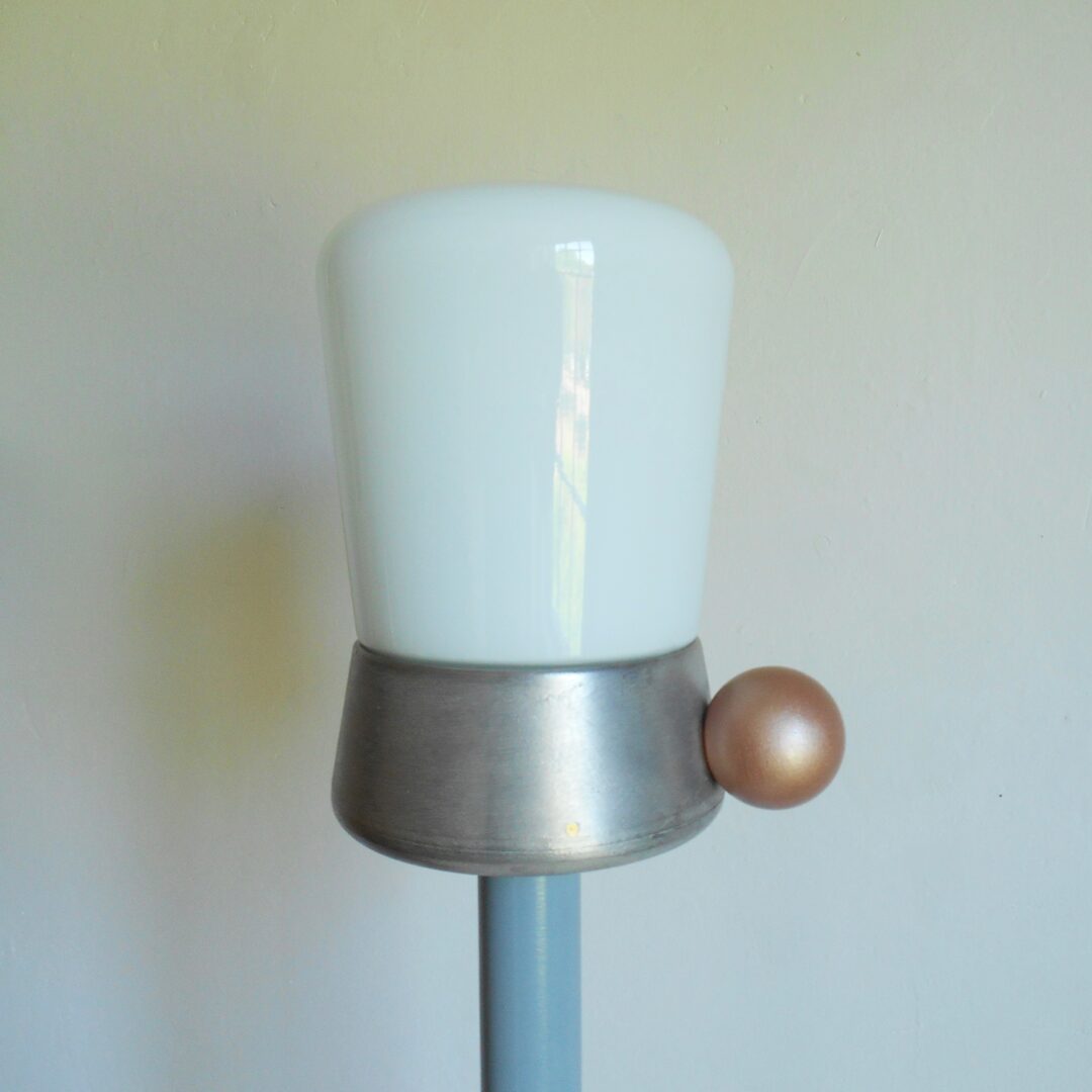 A mid century style floor lamp by Fiona Bradshaw Designs