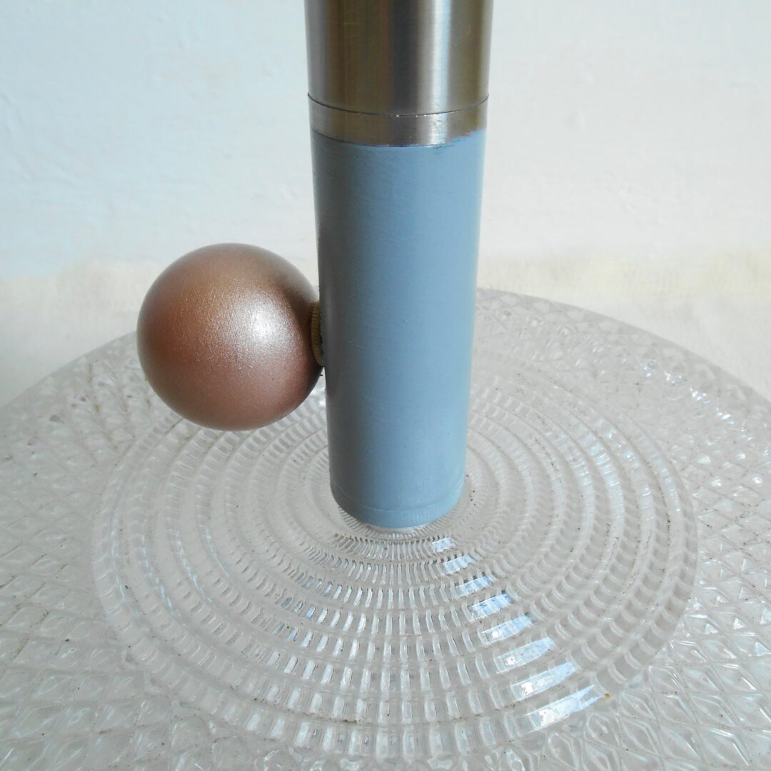 A mid century style floor lamp by Fiona Bradshaw Designs