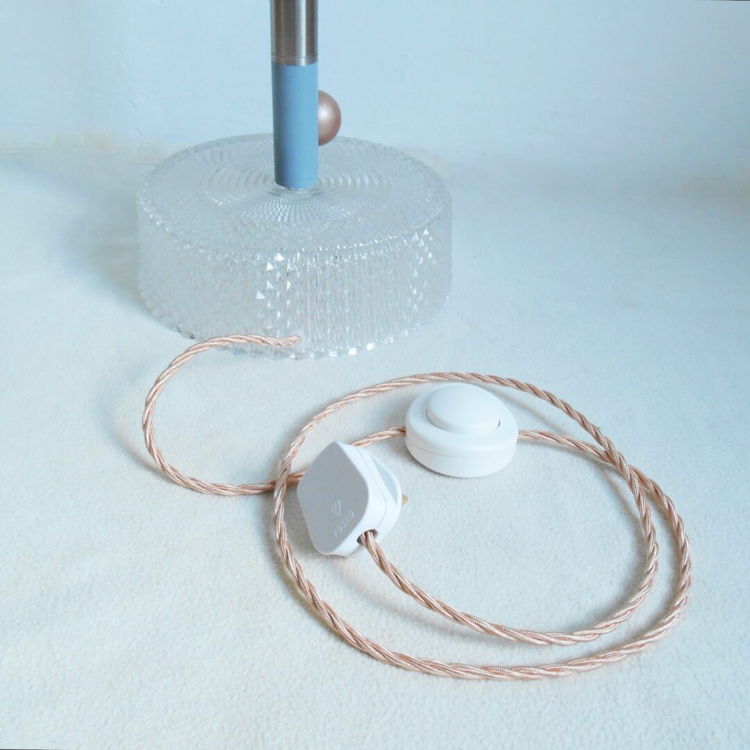 A mid century style floor lamp by Fiona Bradshaw Designs