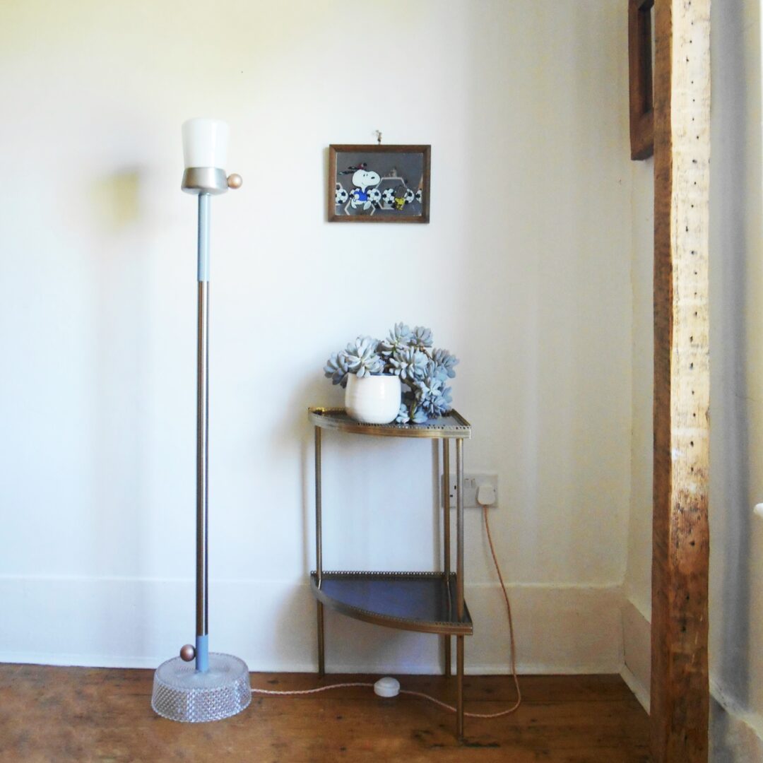 A mid century style floor lamp by Fiona Bradshaw Designs