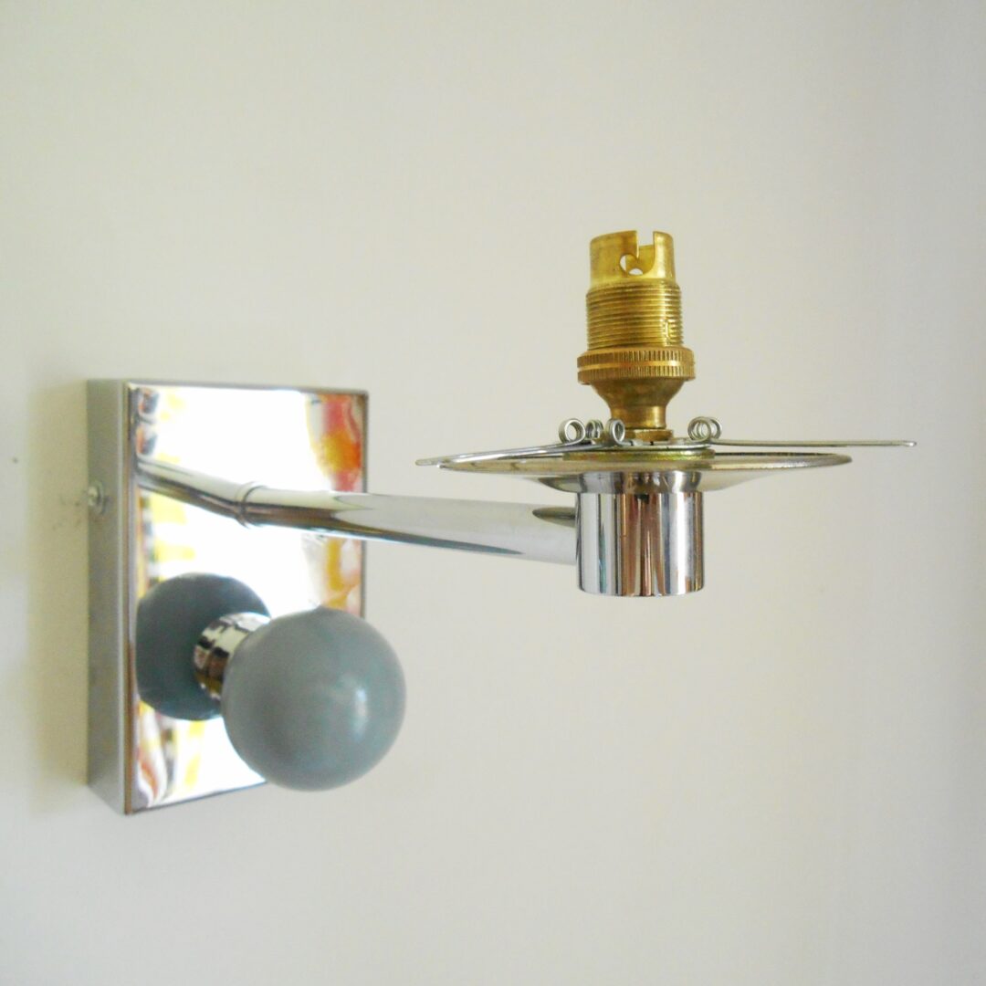 A pair of unique chrome wall lamps by Fiona Bradshaw Designs