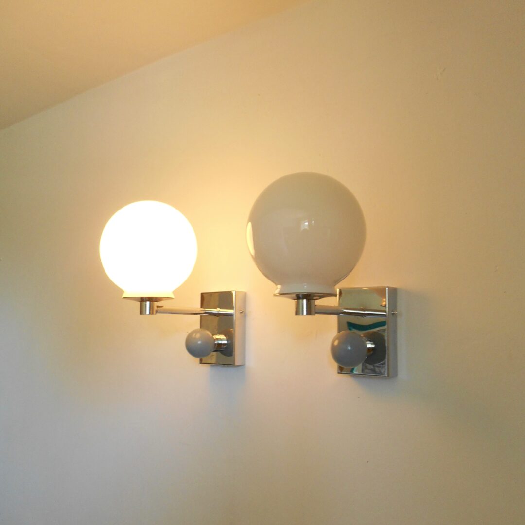 A pair of unique chrome wall lamps by Fiona Bradshaw Designs