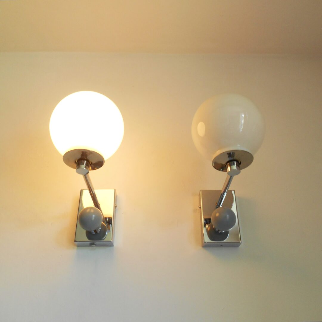 A pair of unique chrome wall lamps by Fiona Bradshaw Designs