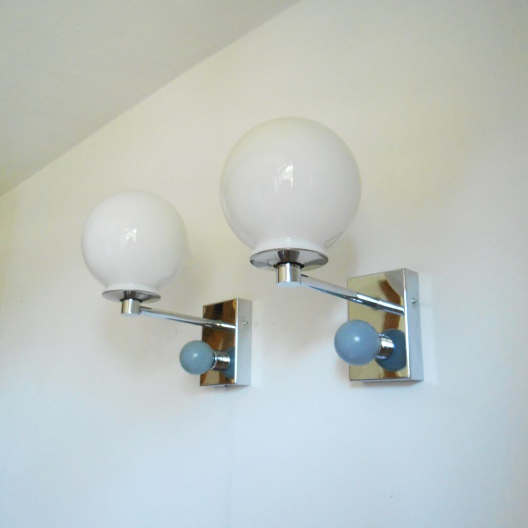 A pair of unique chrome wall lamps by Fiona Bradshaw Designs