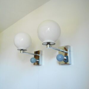 A pair of unique chrome wall lamps by Fiona Bradshaw Designs