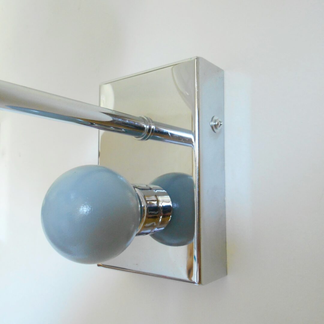 A pair of unique chrome wall lamps by Fiona Bradshaw Designs