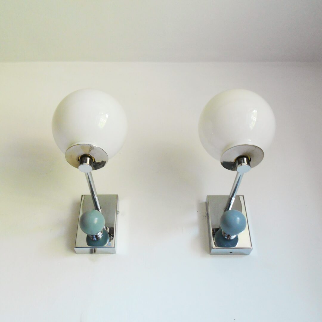 A pair of unique chrome wall lamps by Fiona Bradshaw Designs