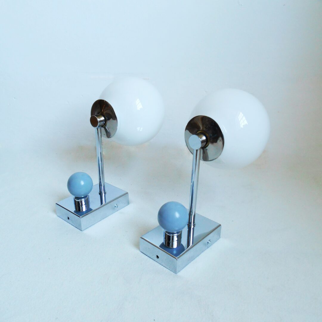 A pair of unique chrome wall lamps by Fiona Bradshaw Designs