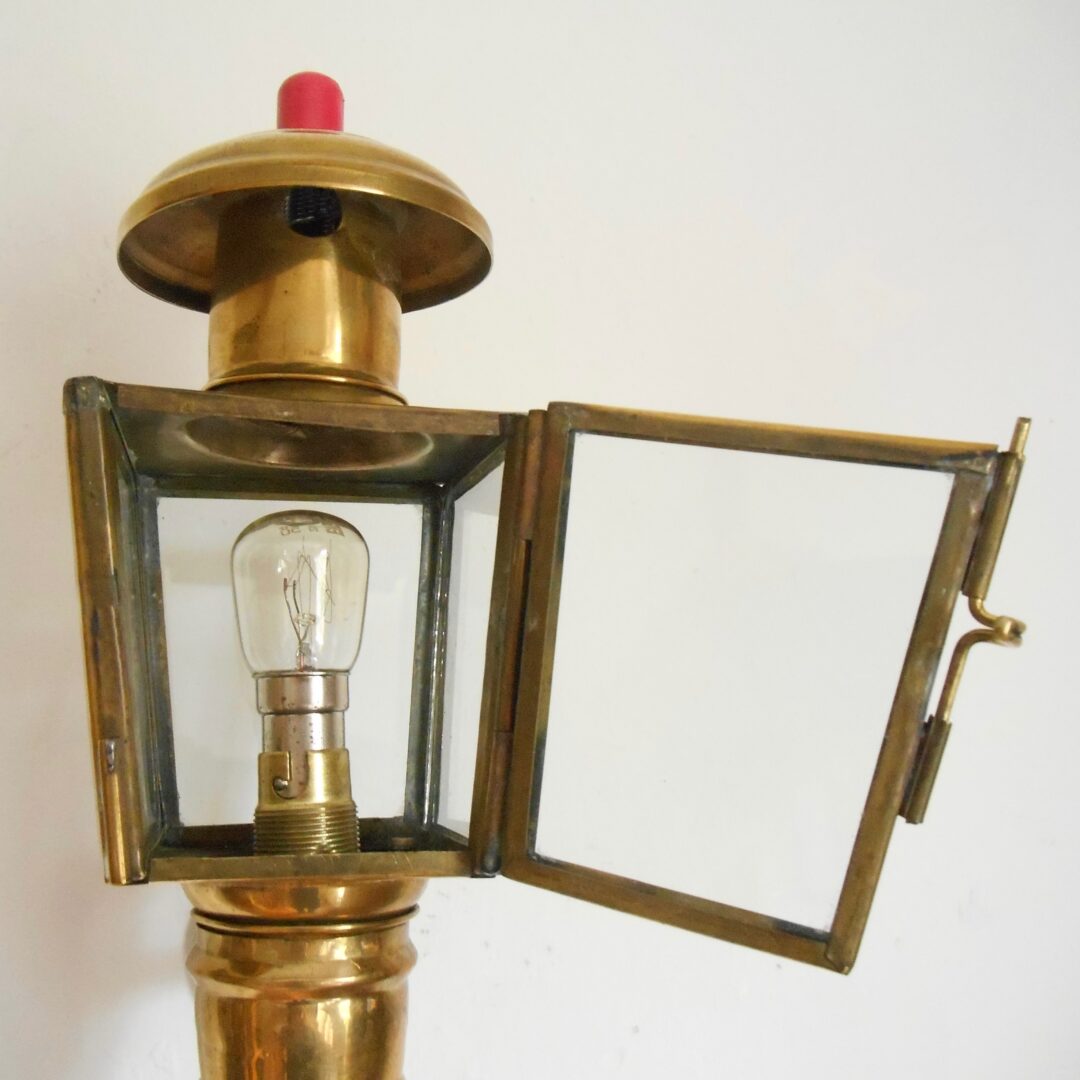 A pair of brass carriage lamps by Fiona Bradshaw Designs