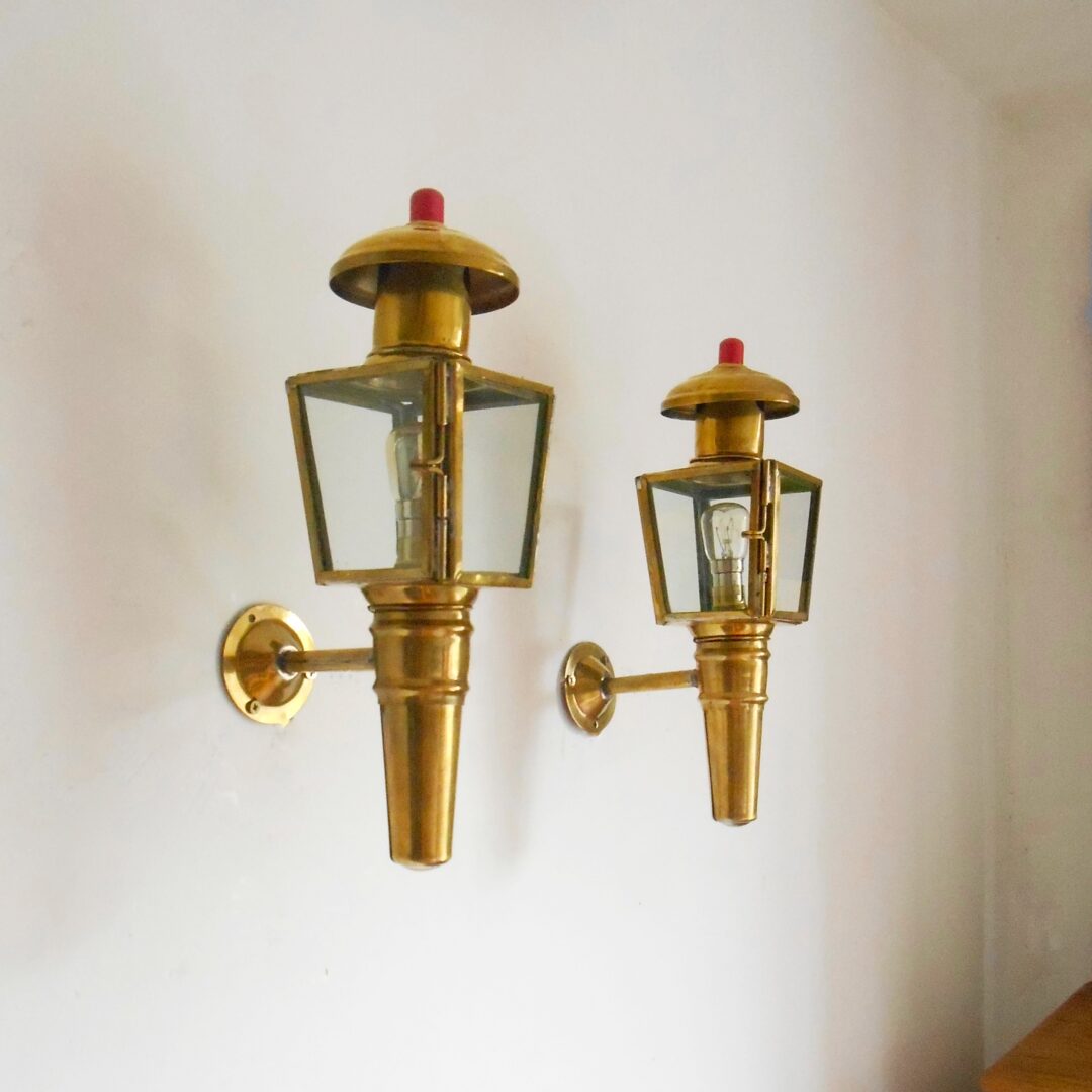 A pair of brass carriage lamps by Fiona Bradshaw Designs