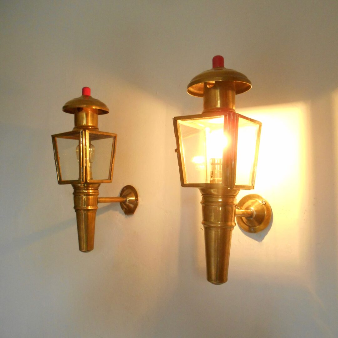 A pair of brass carriage lamps by Fiona Bradshaw Designs