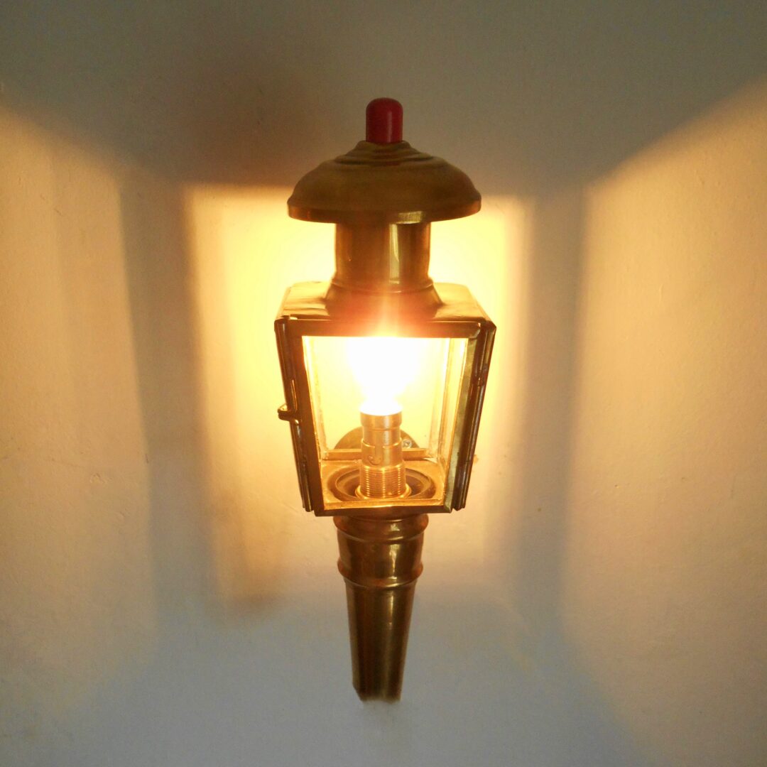 A pair of brass carriage lamps by Fiona Bradshaw Designs